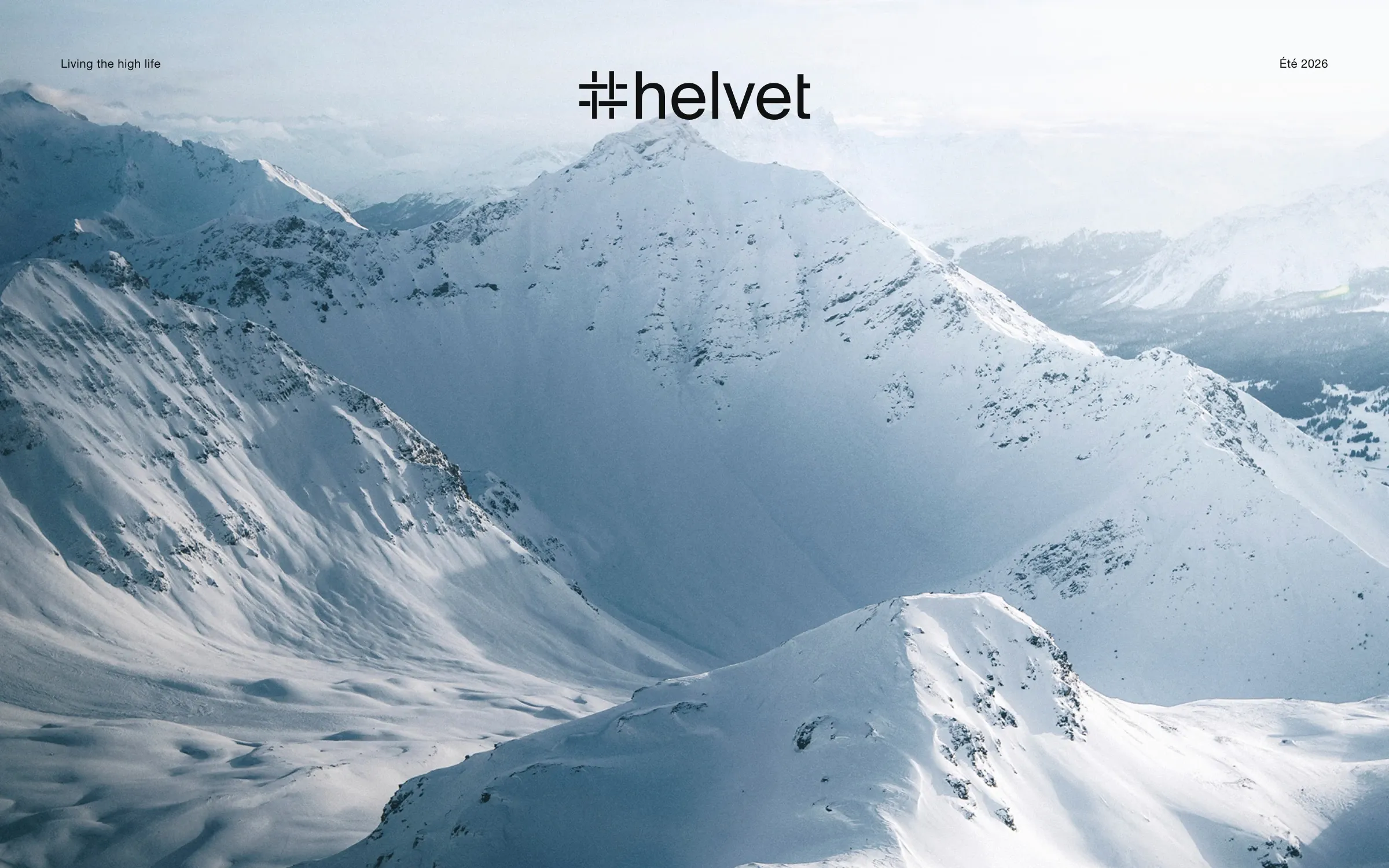 Le logotype helvet au-dessus des sommets enneigés